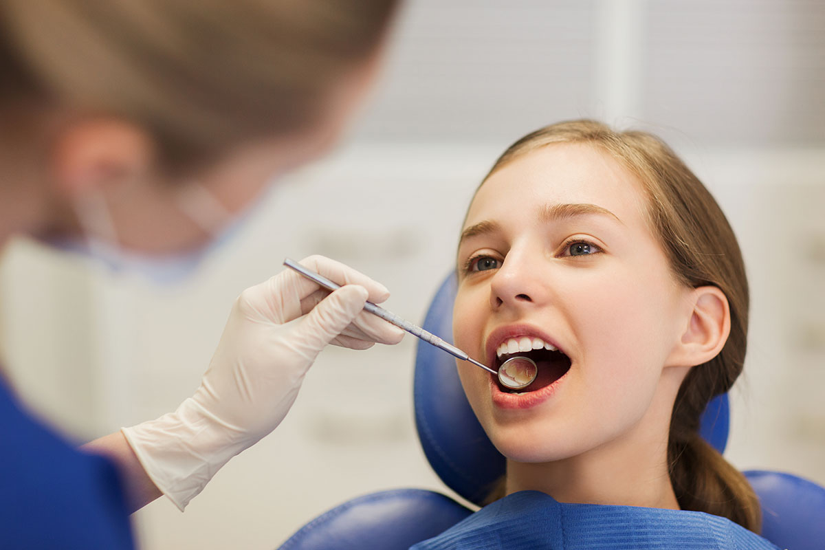 Подросток на приеме у стоматолога